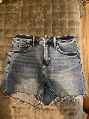 High-Rise Light Blue Distressed Denim Shorts